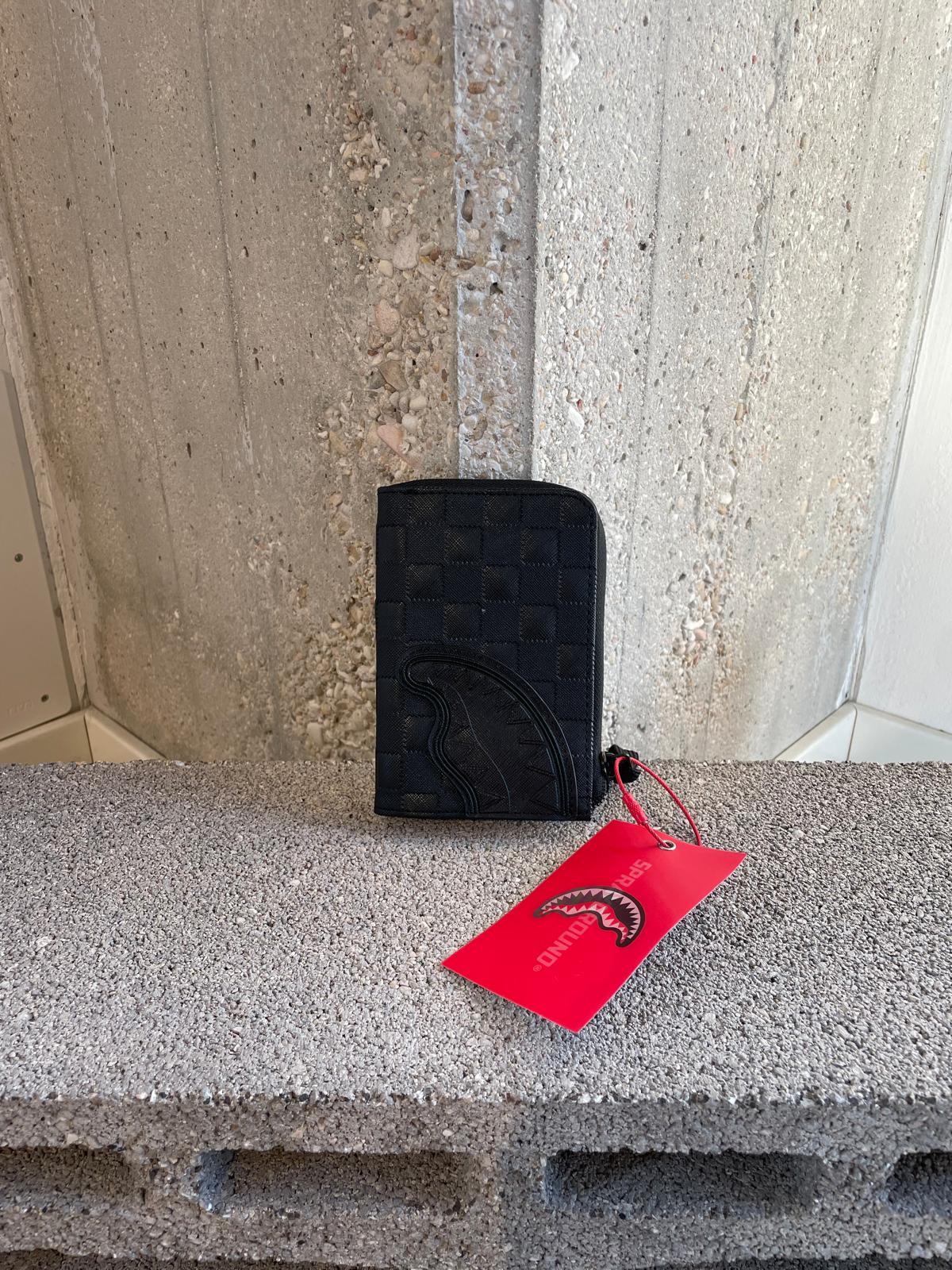 RAISED CHECK WALLET