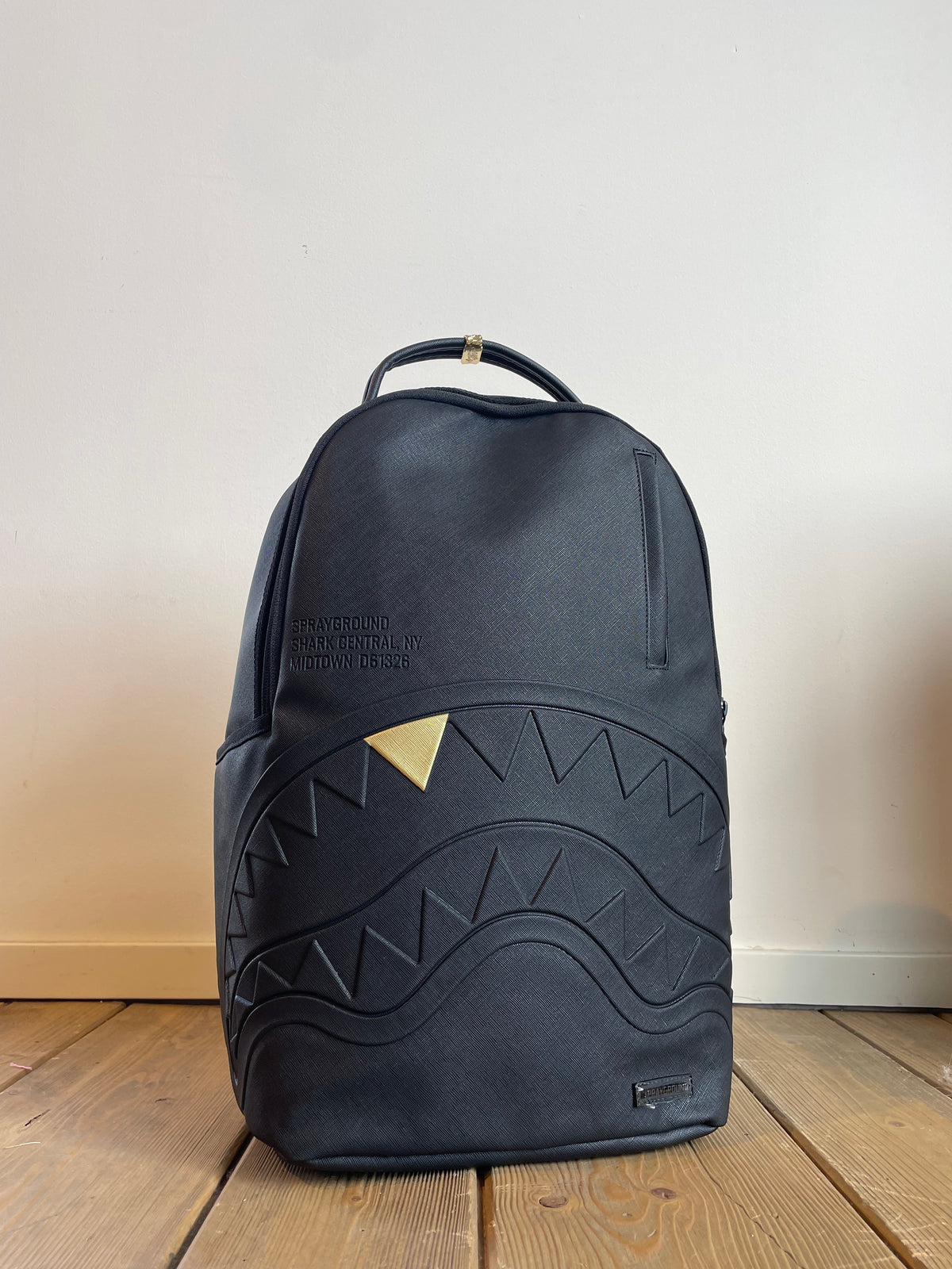 Blacked Out Embossed Gold Tooth Backpack