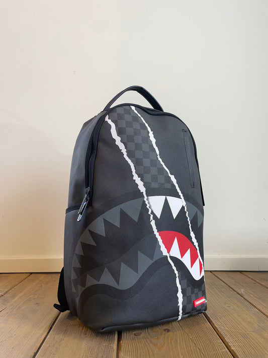Center Rip Revealing Gray Check Backpack